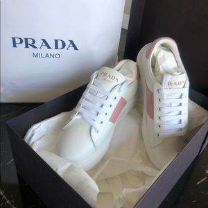 Prada white sneaker, never used before, comes with box bag
